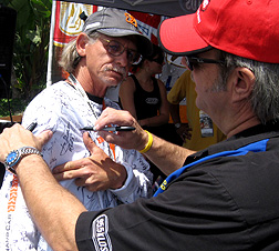 Signing a shirt.