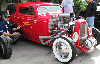 Cypress Auto Body red coupe.